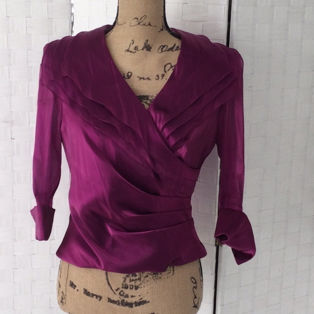Woman’s Blouse by Dressbarn Collection size S color a shiny burgundy dry clean